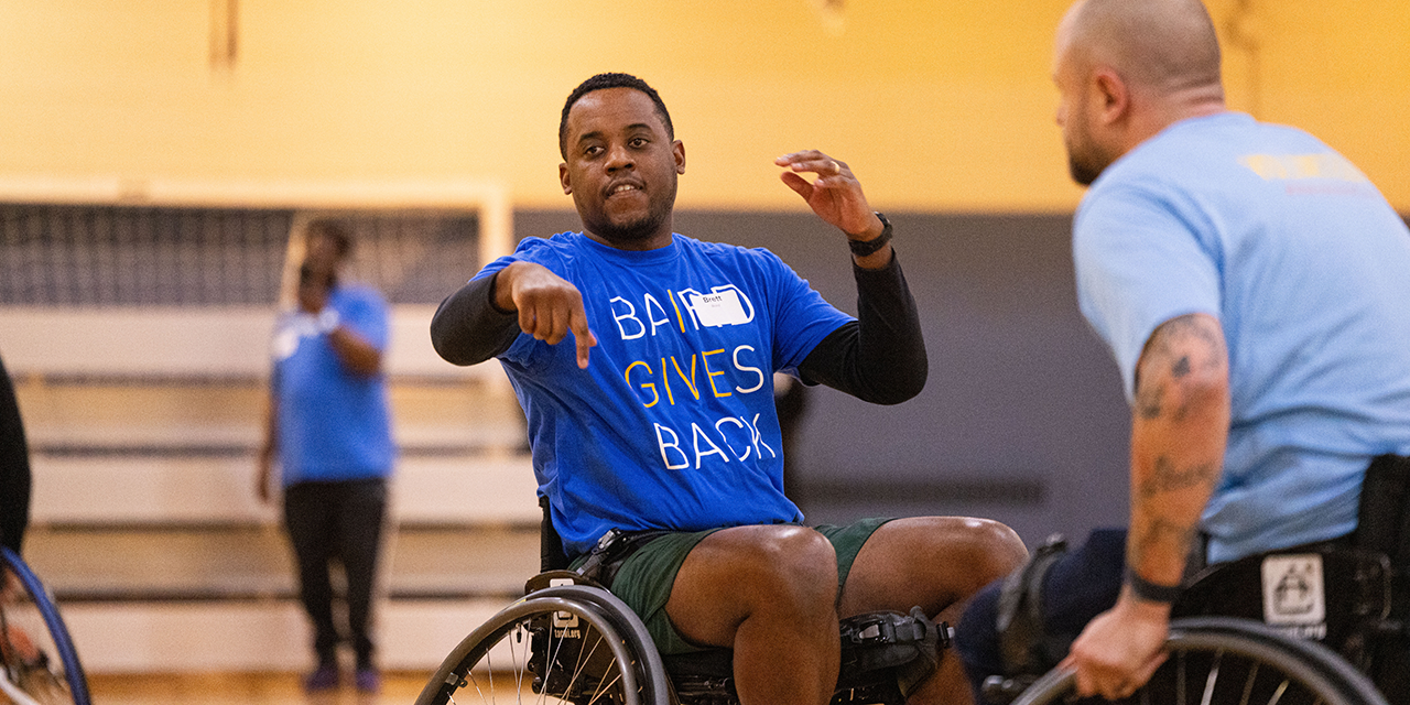 Baird Advisor's associate playing wheelchair basketball.