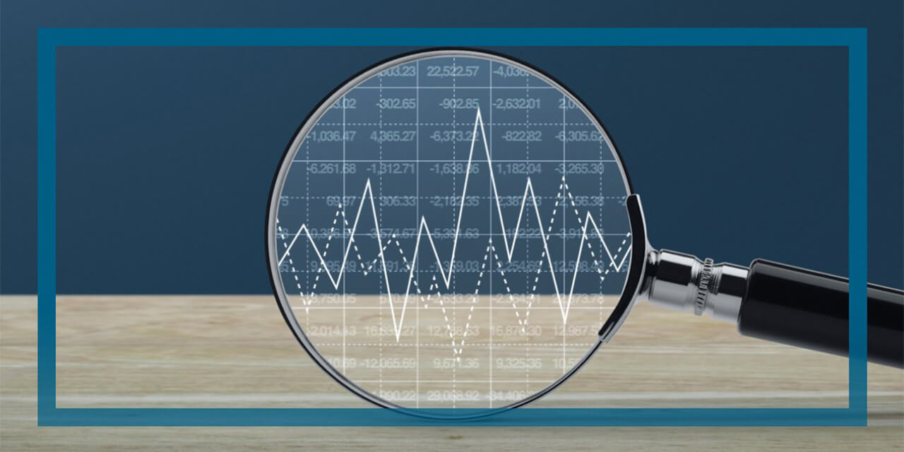Image of a magnifying glass superimposed with an abstract graphic of a generic table of numbers and line graph 