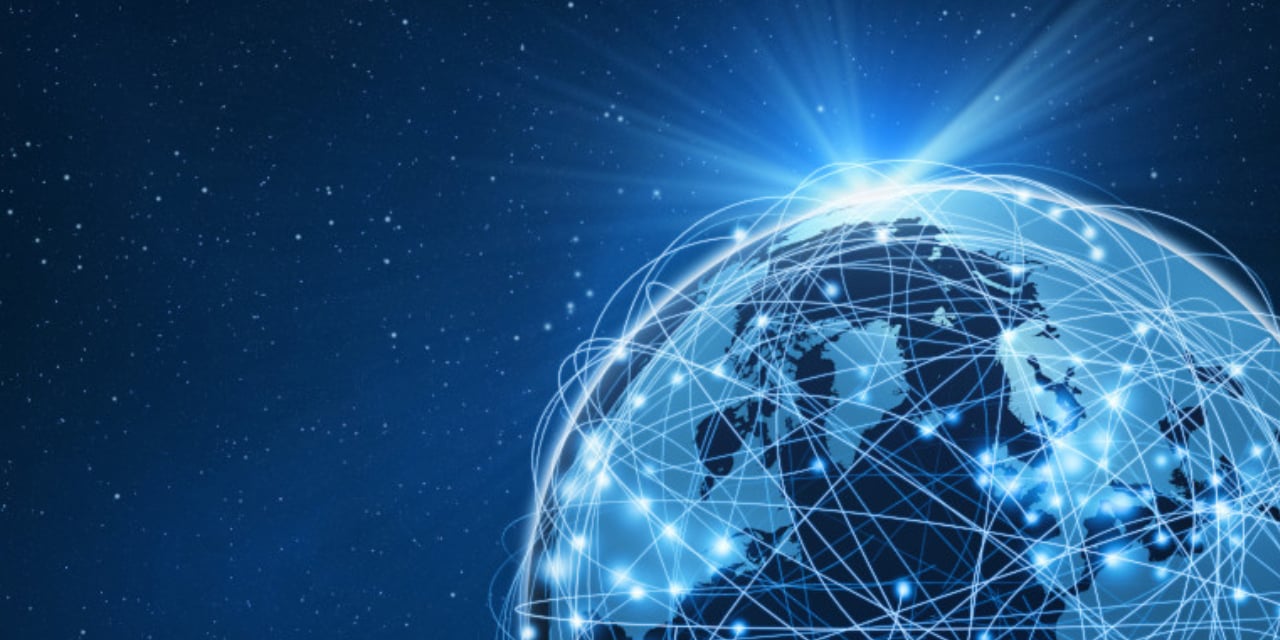 Abstract image of earth from space. Globe covered in representations of digital connections.